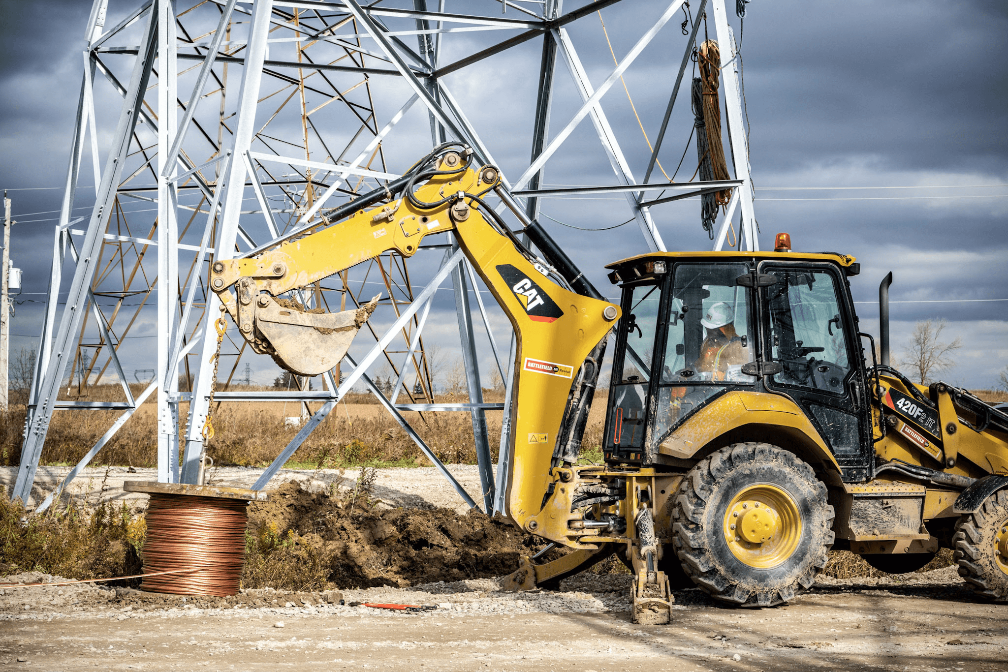 A man operating an excavator.