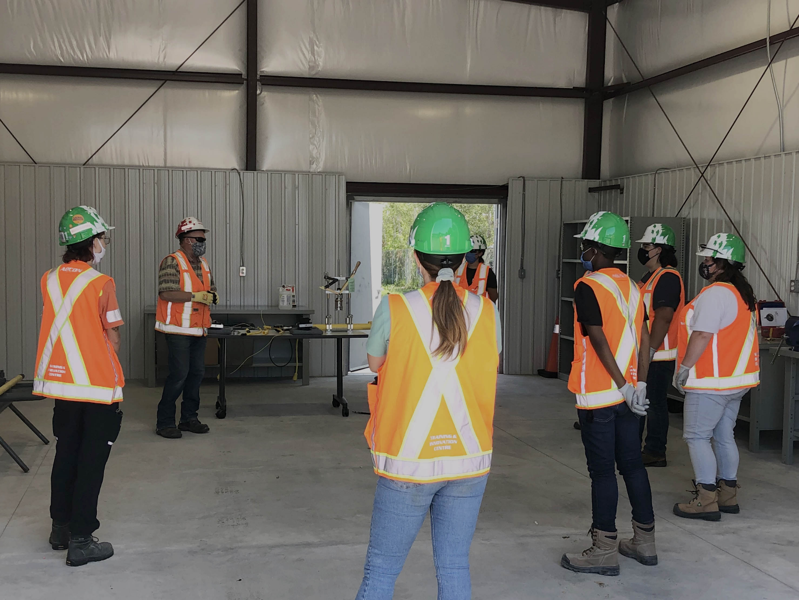 Group of construction professionals meeting in a circle