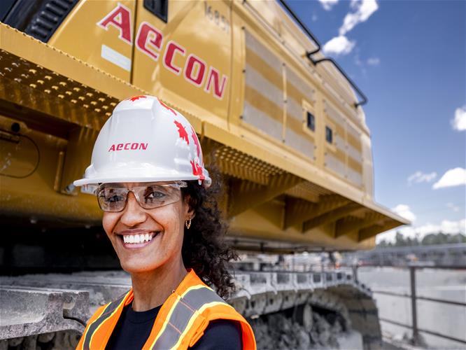 Photo of female Aecon employee on site